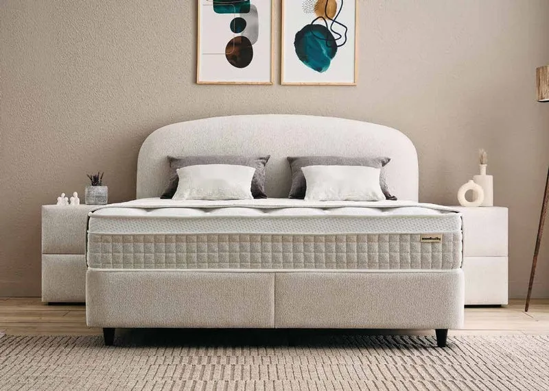 Casa Padrino Luxus Boxspringbett mit geschwungenem Kopfteil Creme 140 x 200 cm - Luxus Schlafzimmer Möbel