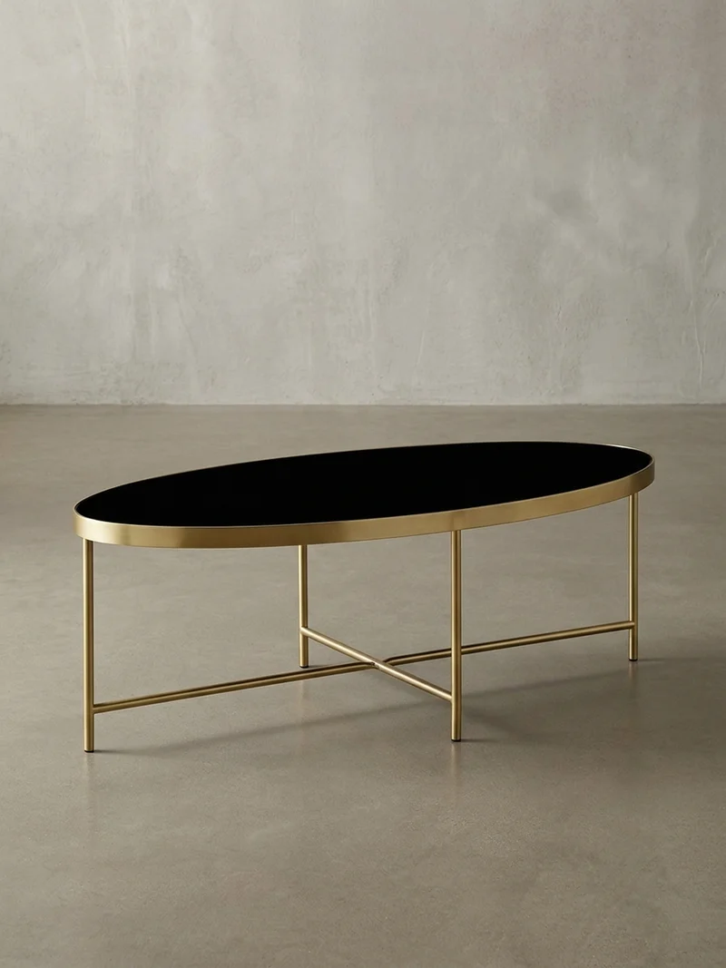 Couchtisch Oval in Schwarz/Gold, Glasplatte mit filigranem Metallgestell, Maße 110x56 cm