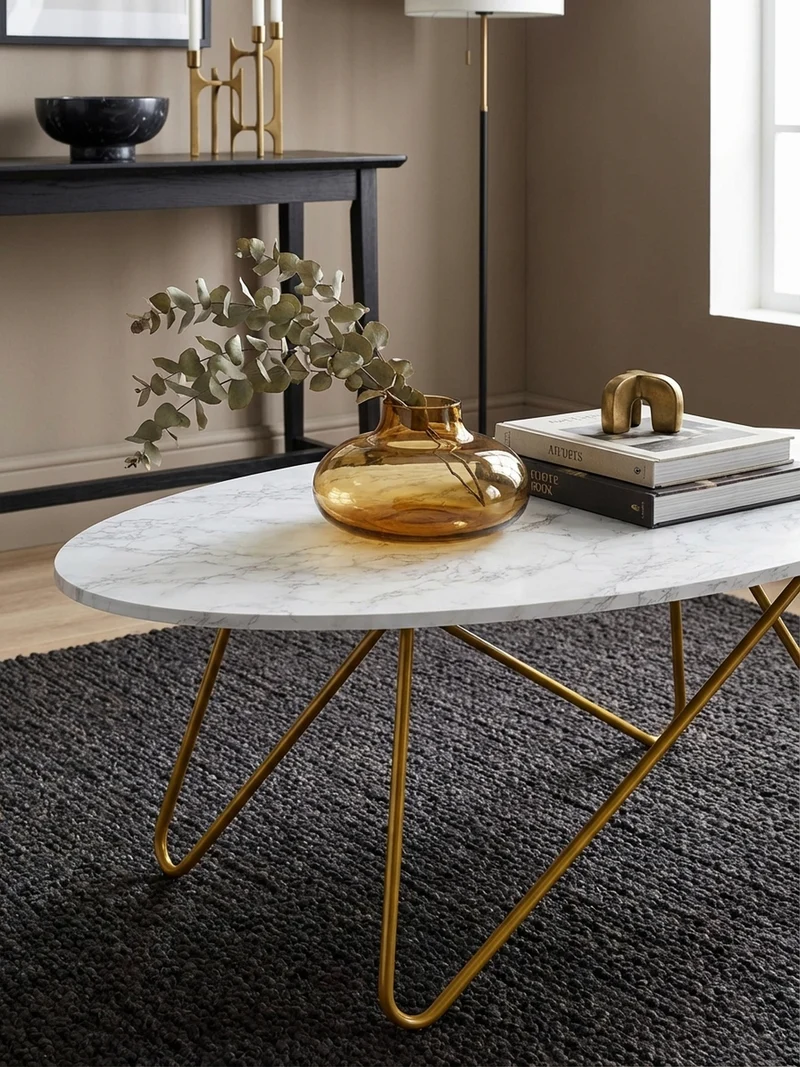 Couchtisch Oval in Marmor-Optik mit goldfarbenem Gestell, Maße 120x40x60 cm