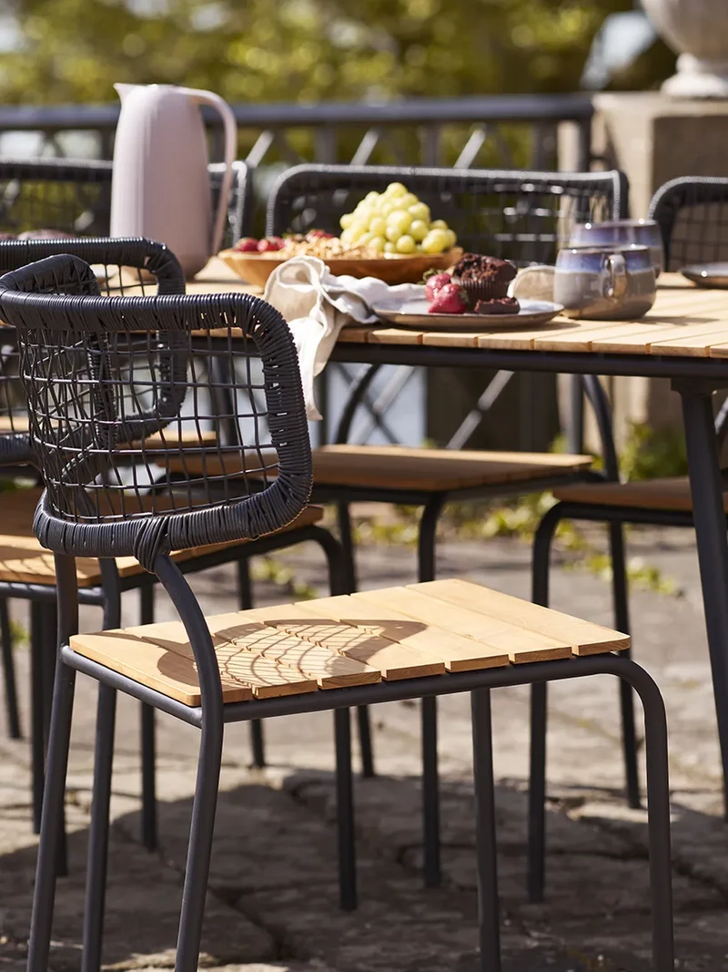Nashville Esszimmerstuhl Teak/Polyrattan, schwarz/natur, schwarze Beine