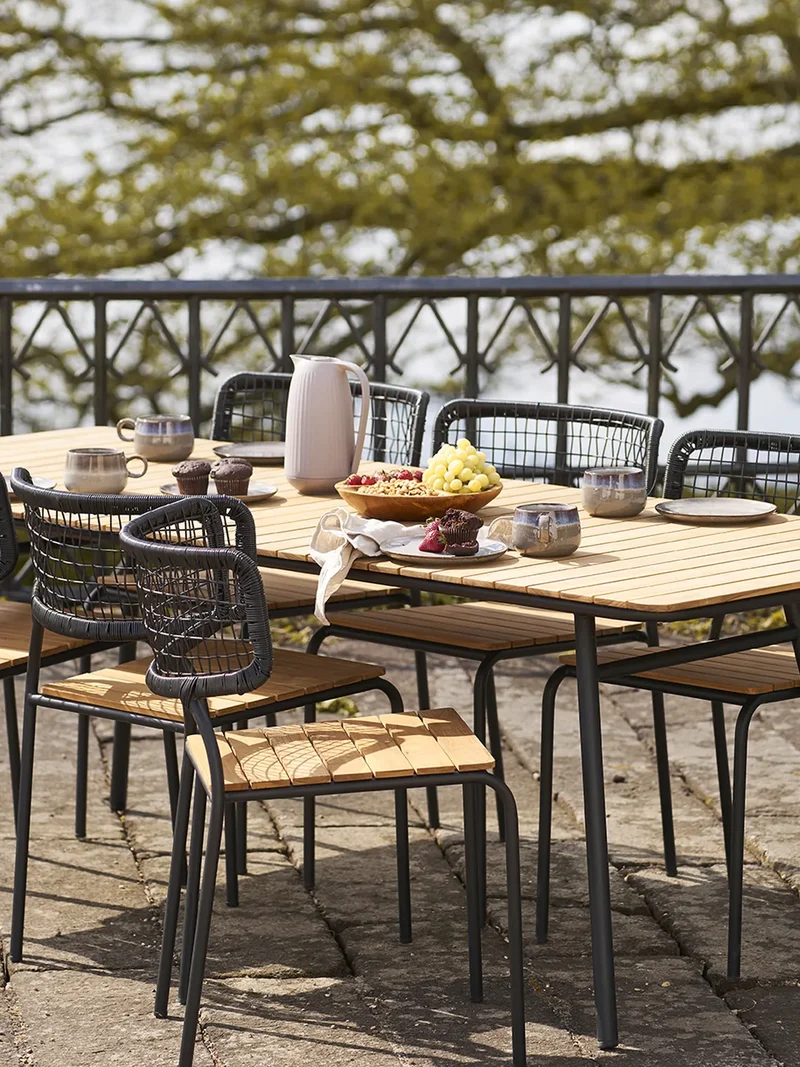 Nashville Esszimmerstuhl Teak/Polyrattan, schwarz/natur, schwarze Beine