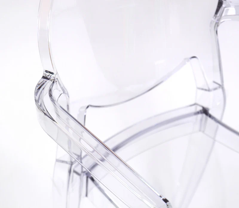 Design Stuhl mit Armlehne transparent mit Sitzkissen